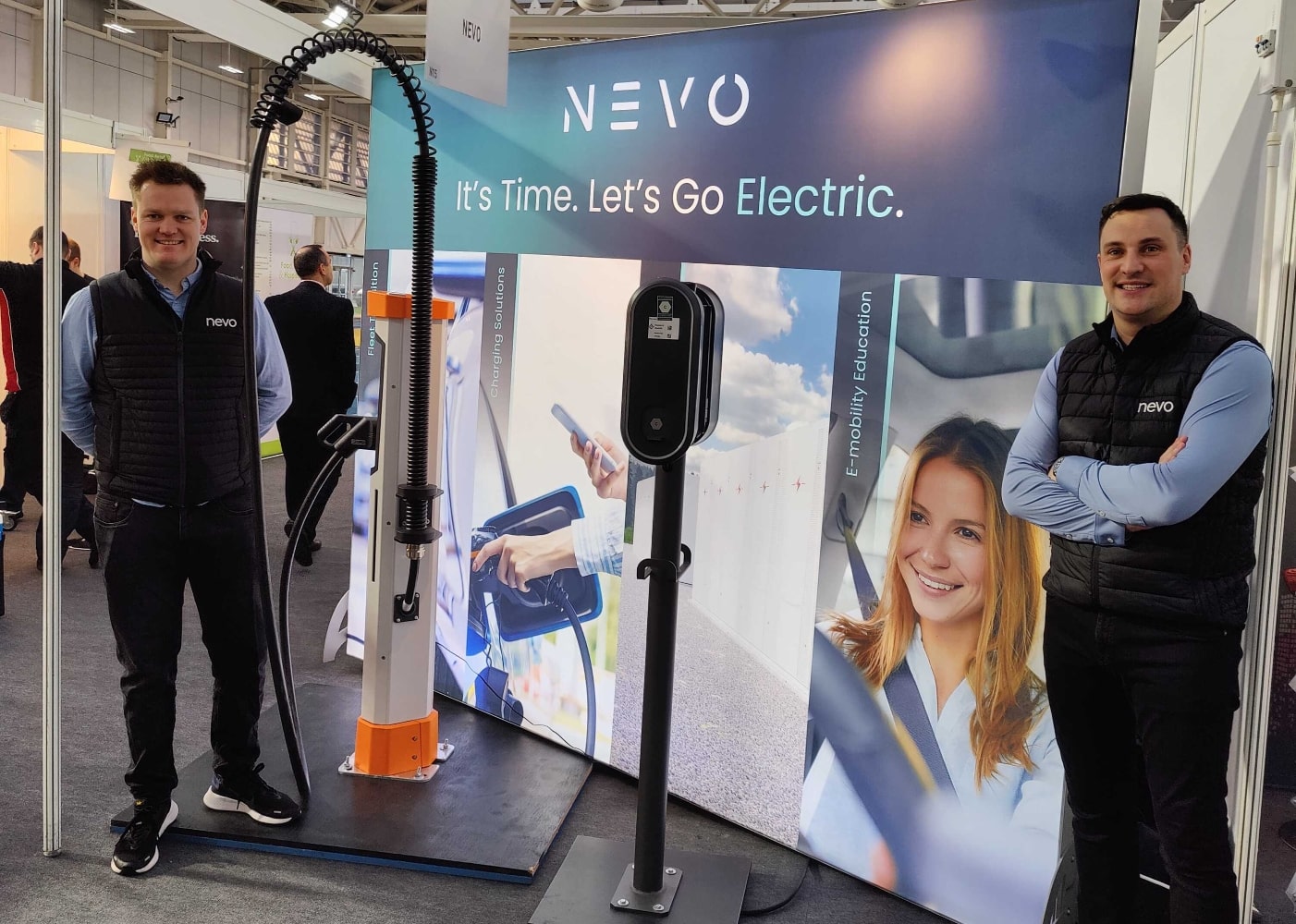 Derek and Liam are cool standing on the Nevo stand
